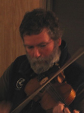 Hank playing the fiddle