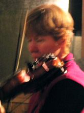 Margaret playing the fiddle
